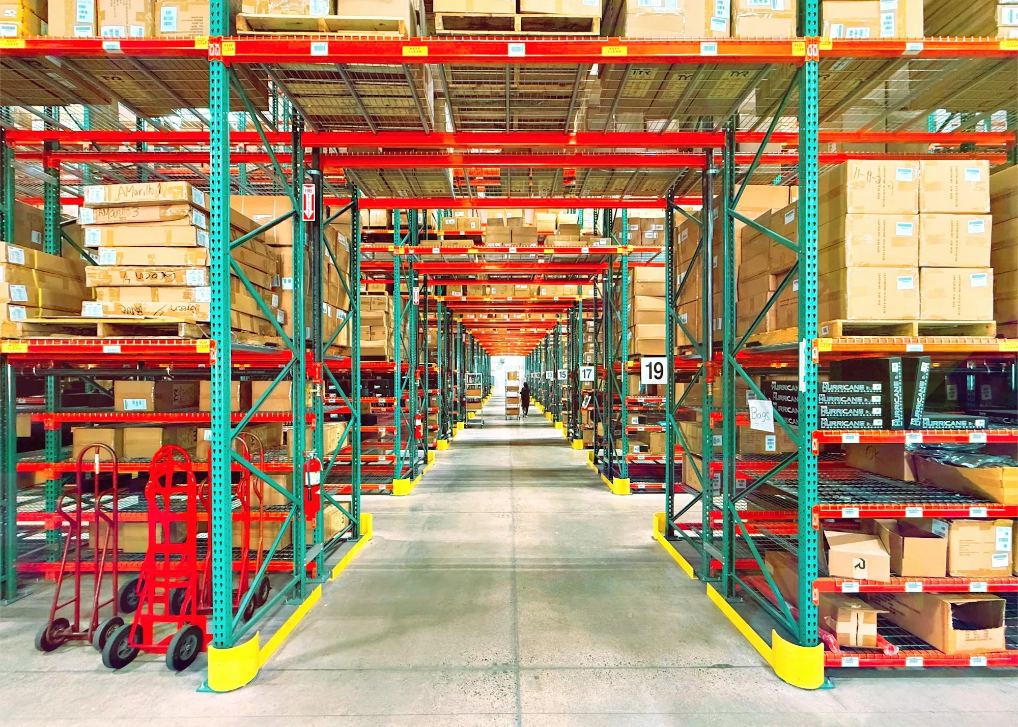 Warehouse racking stacked with cartons